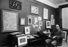 Clifford Odets at his desk with a selection of works from his Paul Klee collection, 1951